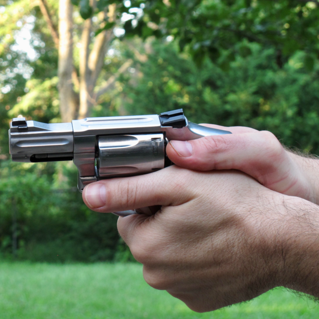 Thumbs-Forward Revolver Grip