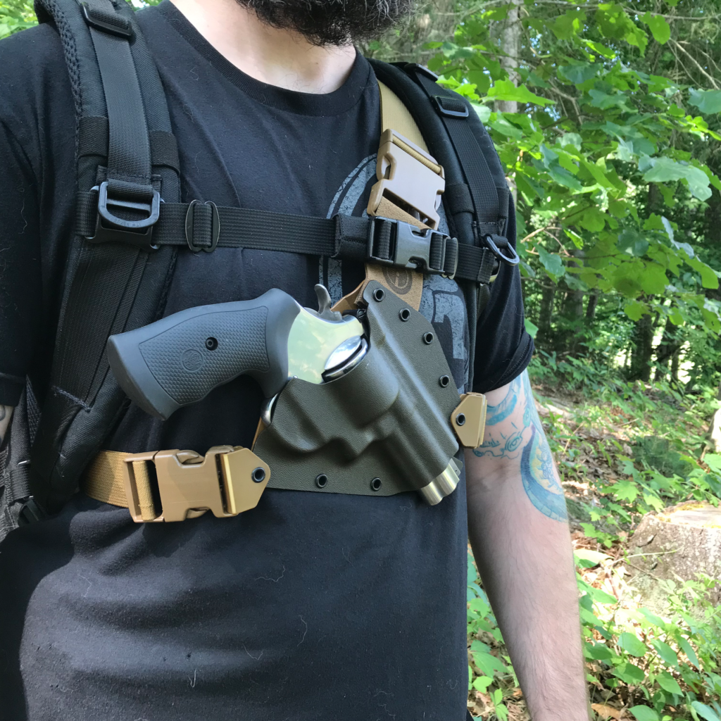 Kenai Chest Holster under a backpack
