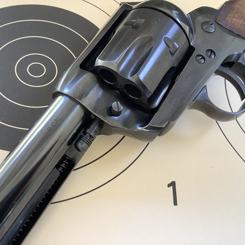 A cowboy-style revolver with interchangeable 9-shot cylinder: from